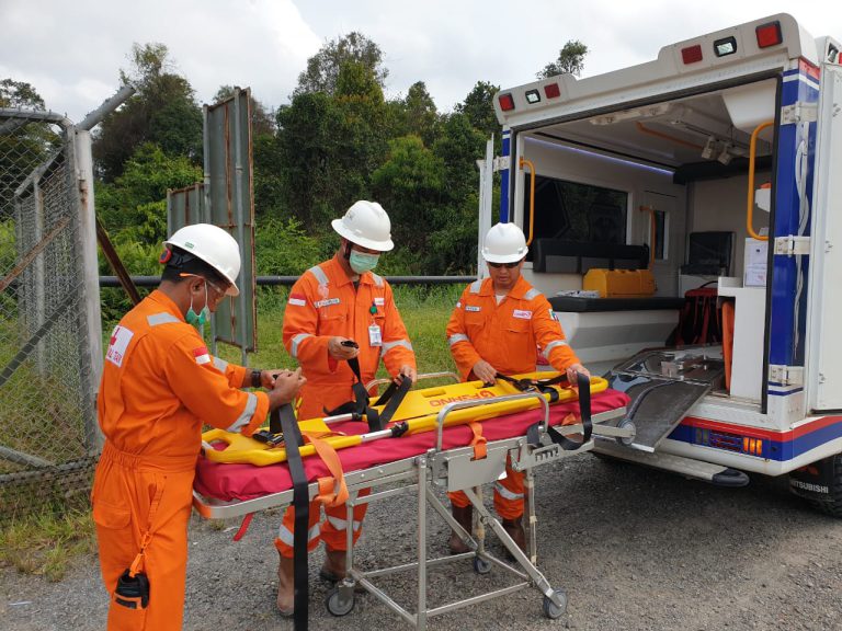 Staff preparing stretcher to be used for deployment